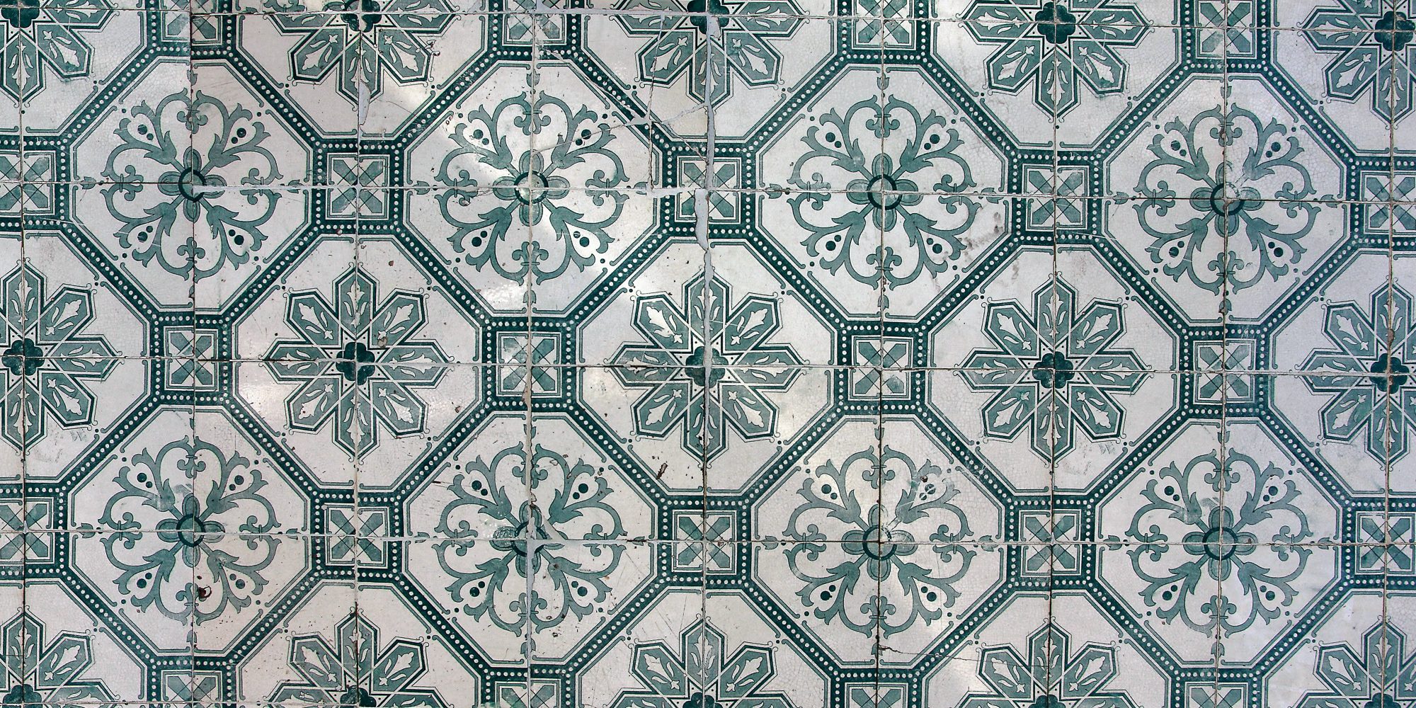 Beautiful Portuguese tiles with a green flora motif.jpg